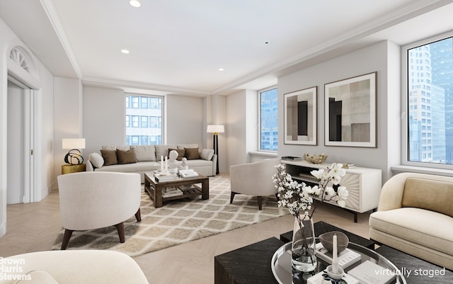 living room with light parquet floors and ornamental molding