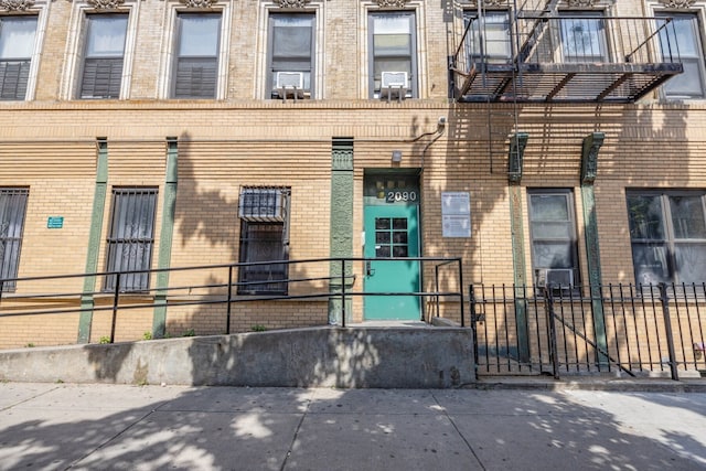 2090 Madison Ave Unit 1D, New York City, NY 10037 - doorway to property featuring brick siding