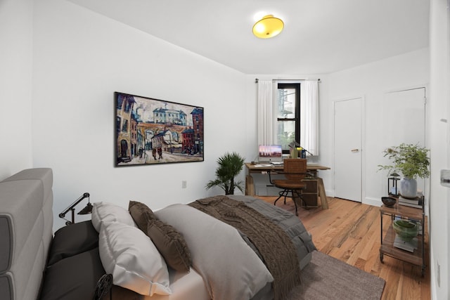 2090 Madison Ave Unit 1D, New York City, NY 10037 - bedroom with light wood-style flooring