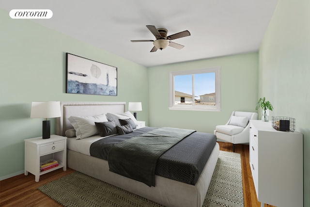 bedroom with dark hardwood / wood-style floors and ceiling fan