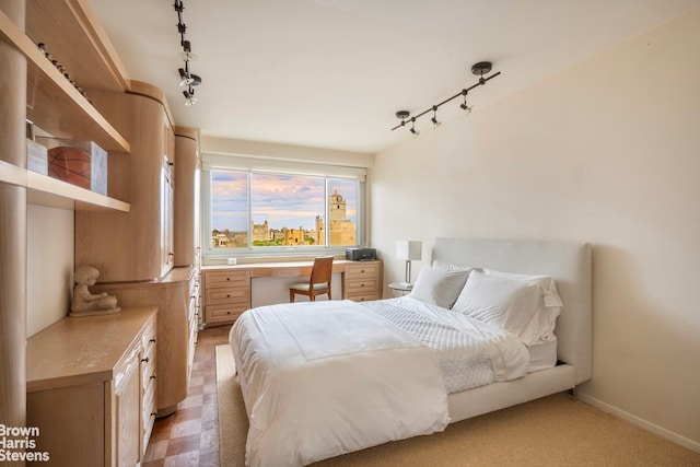 bedroom featuring built in desk