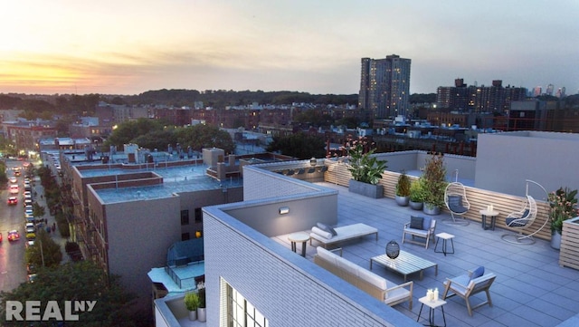 view of patio terrace at dusk