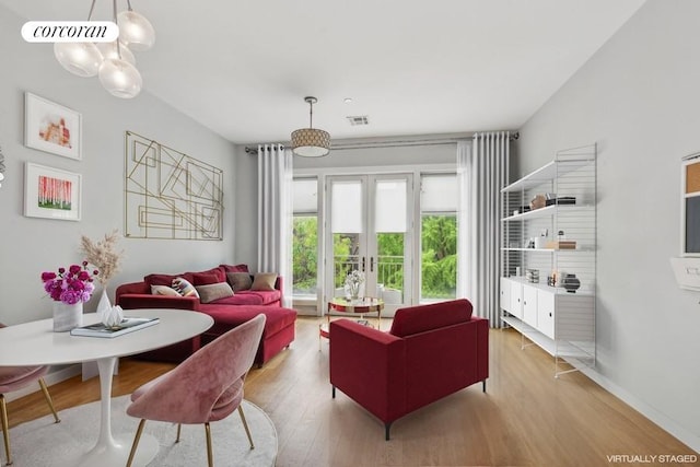 living area with light hardwood / wood-style floors