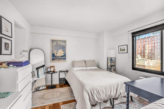 bedroom featuring hardwood / wood-style flooring