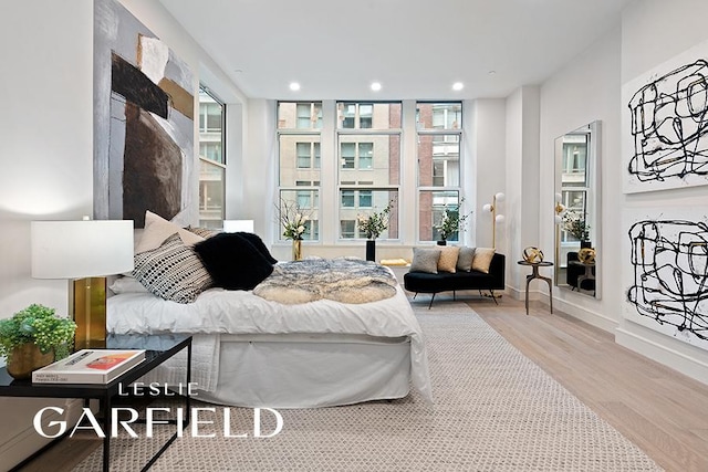 bedroom with light hardwood / wood-style flooring