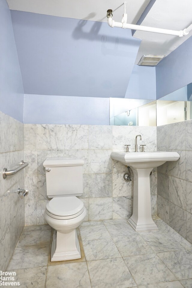 bathroom featuring toilet