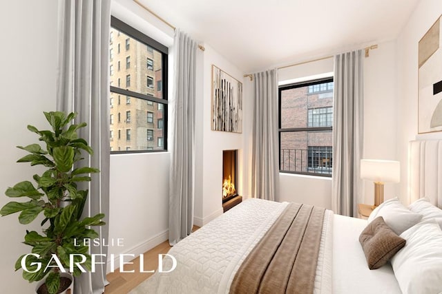 bedroom featuring hardwood / wood-style flooring