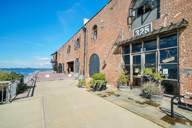 view of property featuring a water view