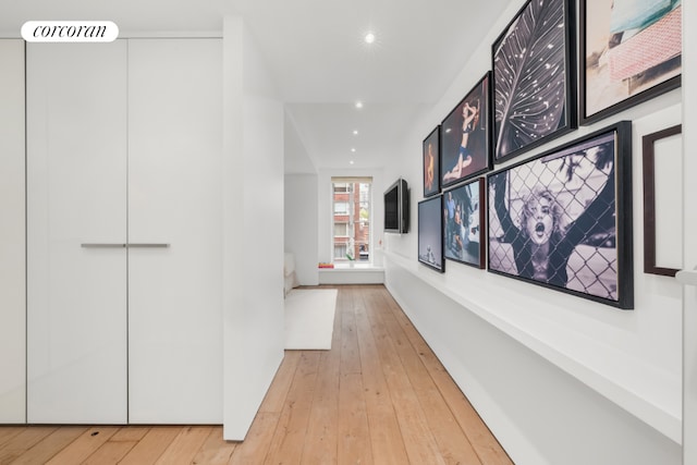 hallway featuring hardwood / wood-style flooring