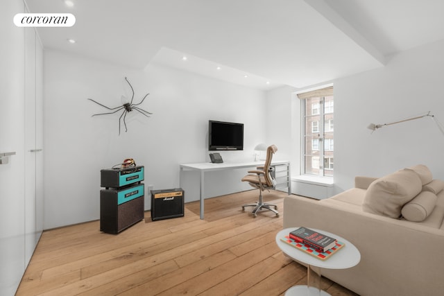 office space with light wood-type flooring