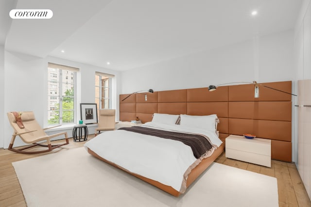 bedroom featuring light hardwood / wood-style floors