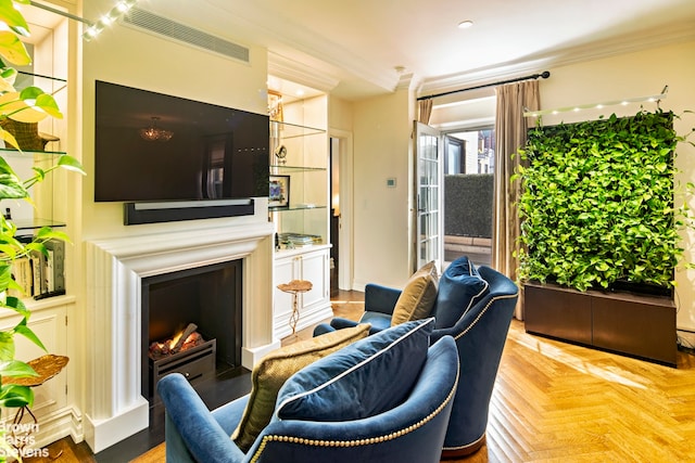 living room featuring parquet floors and ornamental molding