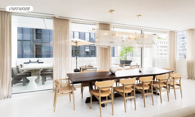 dining room featuring a notable chandelier