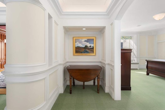 435 E 52nd St Unit 14G, New York City, NY 10022 - corridor featuring a decorative wall, carpet flooring, and ornamental molding