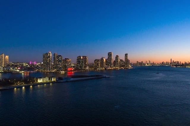435 E 52nd St Unit 14G, New York City, NY 10022 - water view with a skyline view