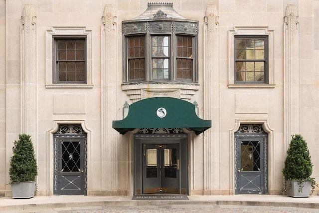 435 E 52nd St Unit 14G, New York City, NY 10022 - doorway to property featuring stone siding