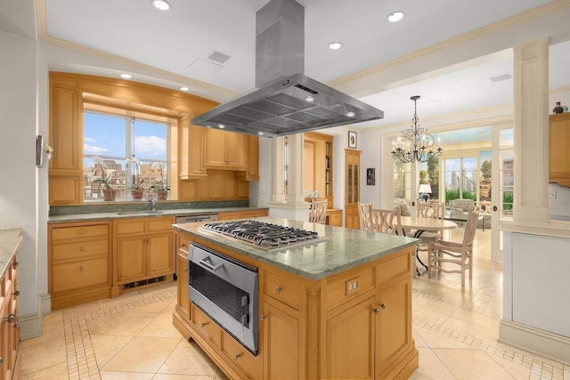 kitchen featuring light tile patterned floors, appliances with stainless steel finishes, ornamental molding, a kitchen island, and island exhaust hood