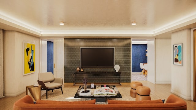 living room featuring a tray ceiling and wood-type flooring