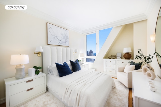 bedroom featuring crown molding