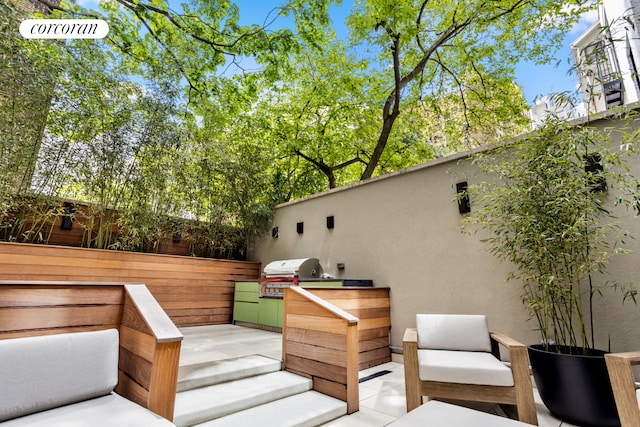 248 W 71st St, New York City, NY 10023 - wooden terrace featuring a patio area