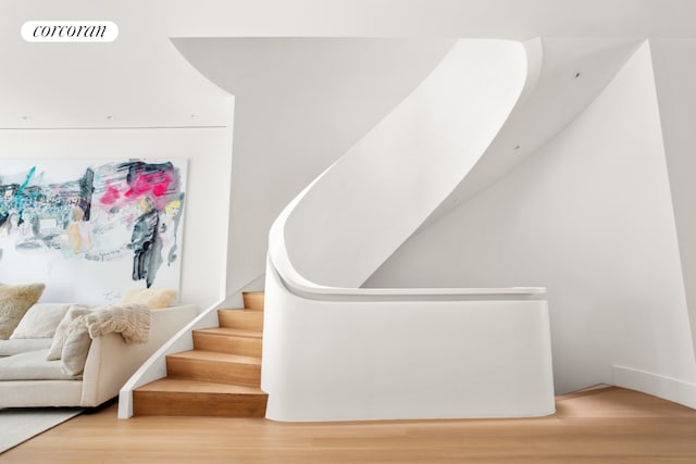 248 W 71st St, New York City, NY 10023 - stairs with wood finished floors