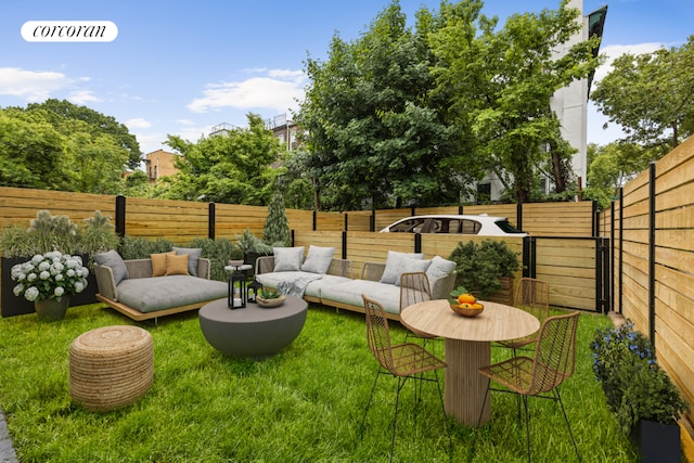 view of yard with outdoor lounge area