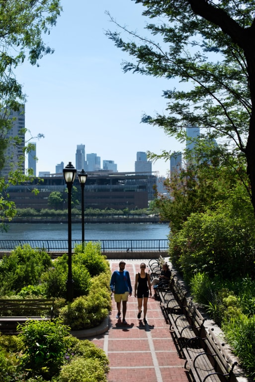 surrounding community with a view of city and a water view