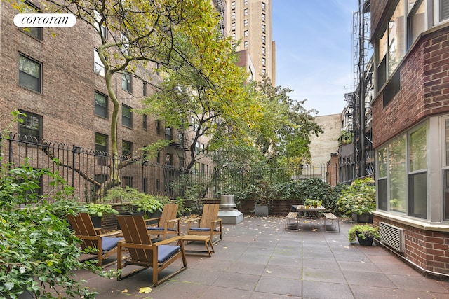 view of patio / terrace with fence