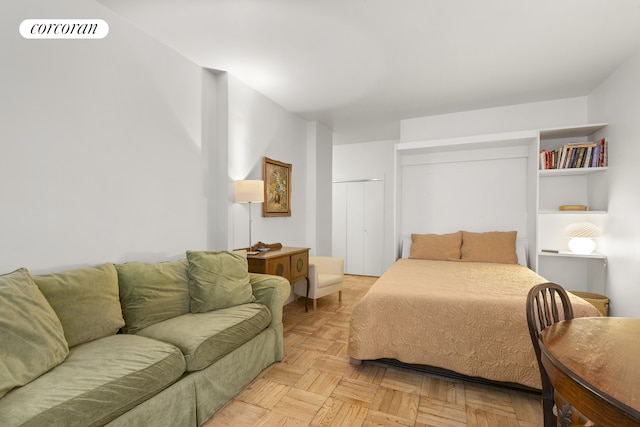 bedroom with visible vents and a closet