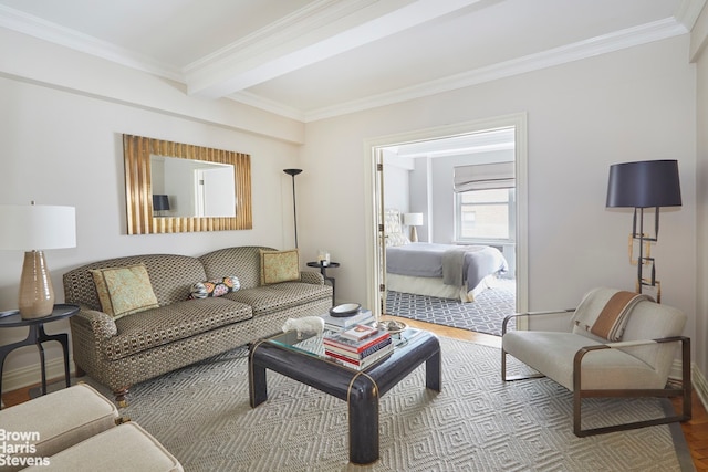 living area featuring beamed ceiling, wood finished floors, baseboards, and ornamental molding