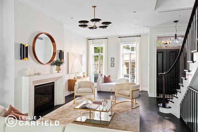 living area featuring ornamental molding