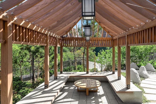 view of patio / terrace featuring fence and a pergola