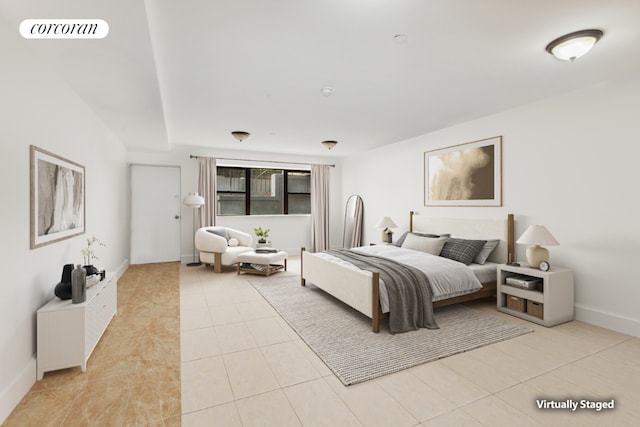 bedroom with light tile patterned floors