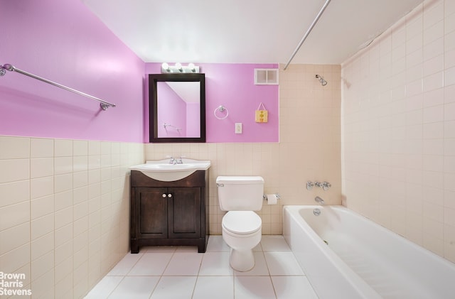 bathroom with visible vents, shower / washtub combination, tile walls, toilet, and tile patterned floors