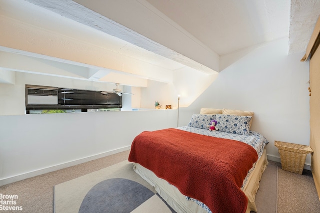 carpeted bedroom with baseboards