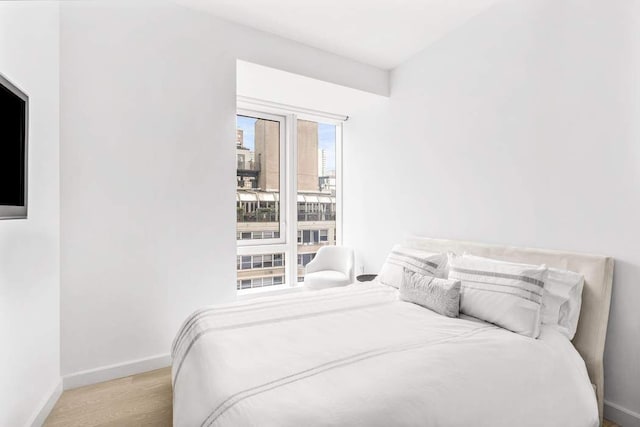 bedroom featuring light hardwood / wood-style flooring