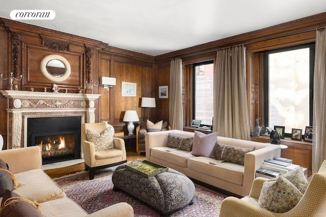 living room featuring wooden walls and hardwood / wood-style floors