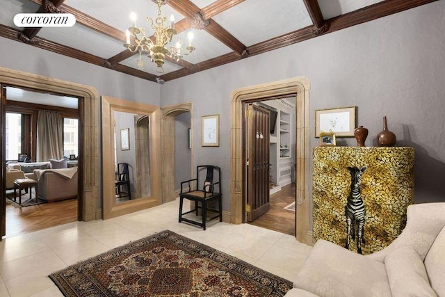 corridor with coffered ceiling, beam ceiling, light tile patterned floors, and a notable chandelier