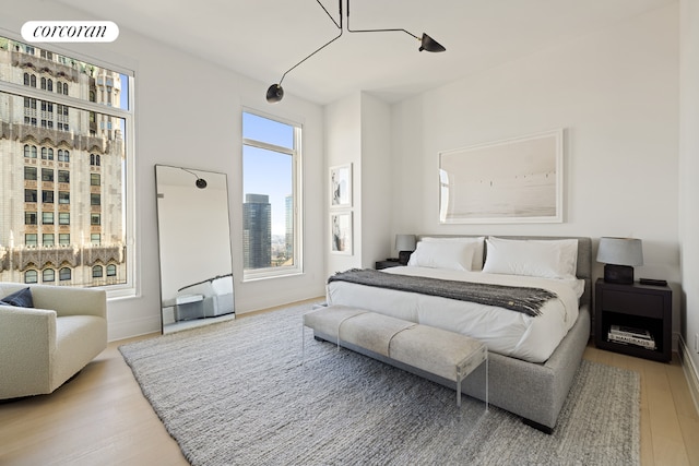 bedroom featuring wood-type flooring