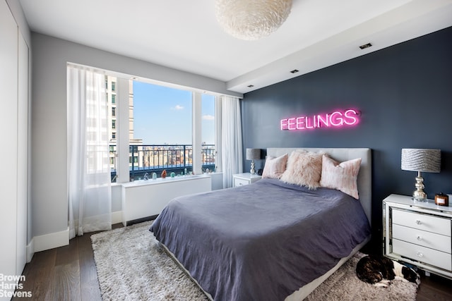 bedroom featuring hardwood / wood-style flooring