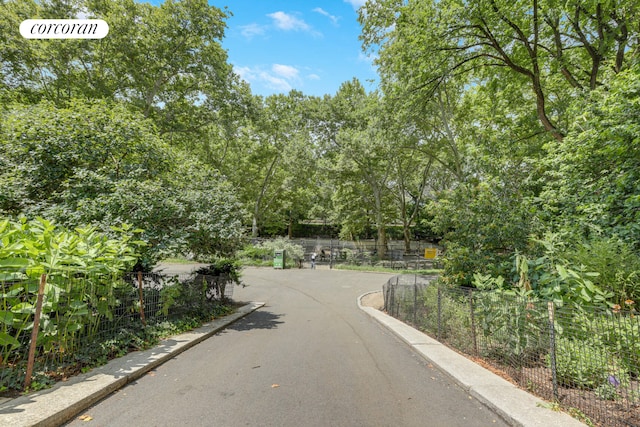 view of road featuring curbs