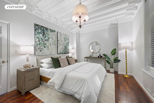 bedroom with a chandelier, visible vents, baseboards, ornamental molding, and wood-type flooring