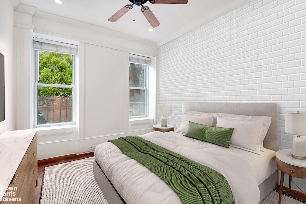 25 Charles St Unit 1C, New York City, NY 10014 - bedroom featuring crown molding, recessed lighting, ceiling fan, and wood finished floors