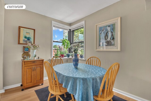 72-11 110th St Unit 3B, New York City, NY 11375 - dining area featuring light wood finished floors and baseboards