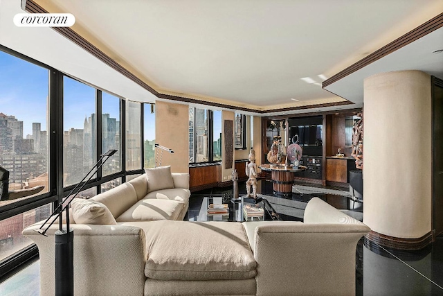 living room with ornamental molding