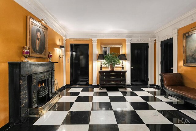 sitting room featuring parquet flooring