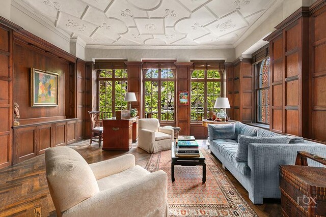 carpeted bedroom with beam ceiling