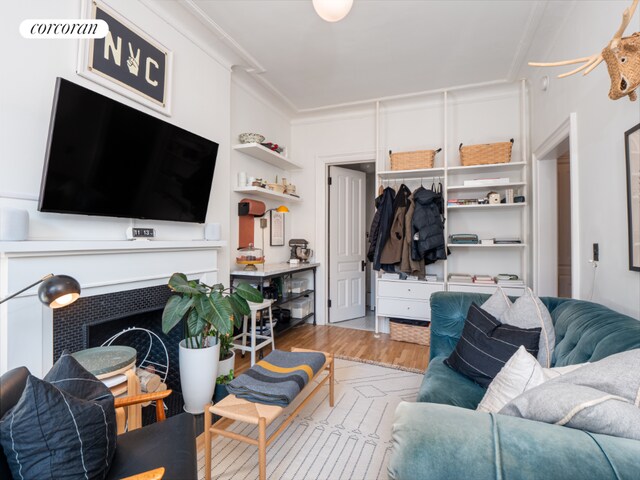 spare room with light wood-type flooring and radiator heating unit