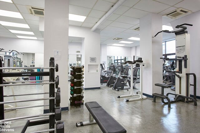 workout area with a drop ceiling