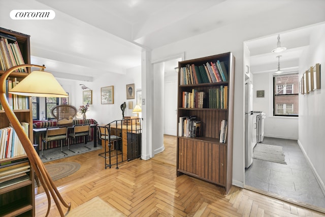 hallway featuring parquet flooring